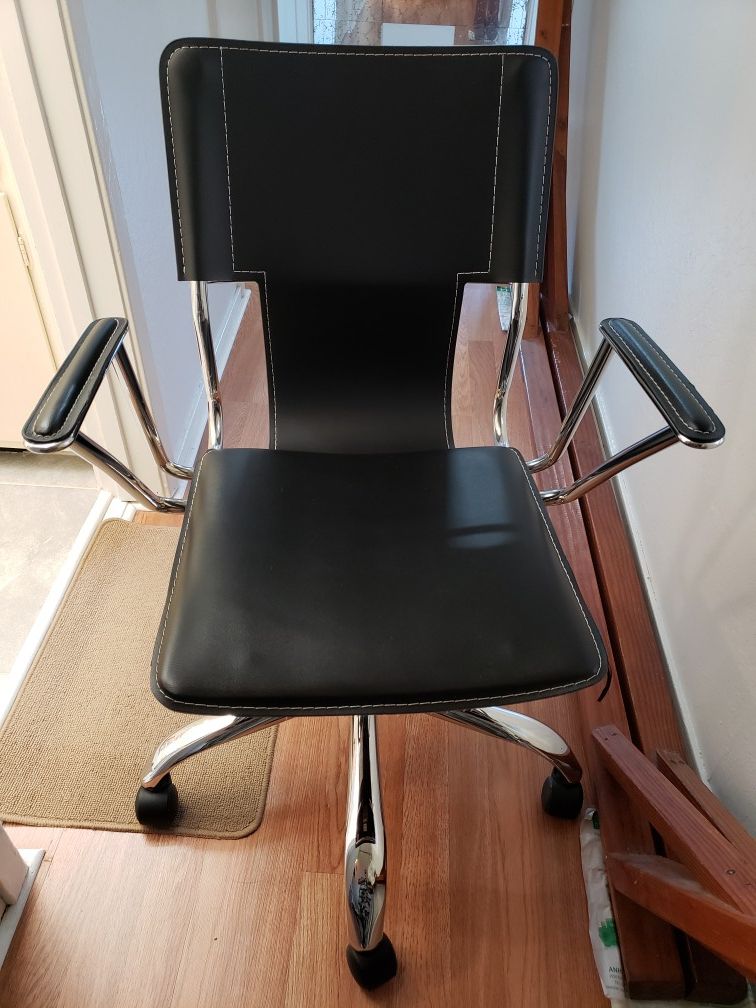 Black leather and metal office chair