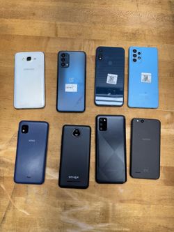 Lot of 8 Assorted storage unit Smartphones untested do turn on