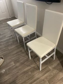 Sturdy white vinyl chairs