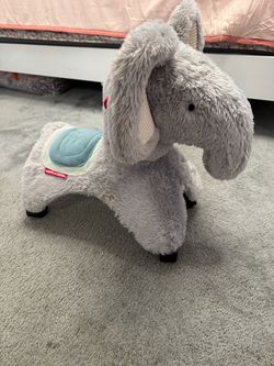 Radio flyer rolling elephant ride on