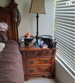 Wood Nightstand with Carved Detail and Drawers