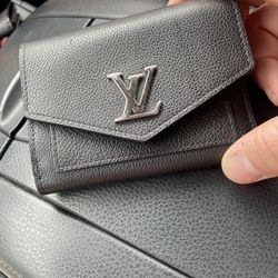 2 SeparateLouis Vuitton Black leather Wallets (separate Or Pair)