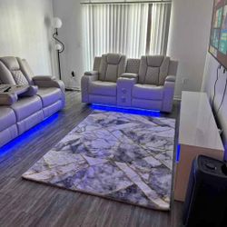 Electric reclining sofa and loveseat