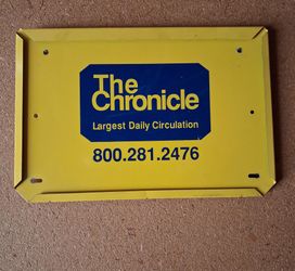 Sign from old newspaper stand