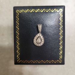 10 K White Gold Diamond Pendant.  Weight Is 1.2 Grams 