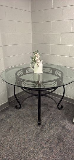 Patio table with upholstered chairs