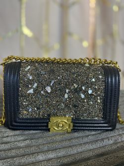 Black Shoulder Bag With A Chain And Leather Strap And Gold Hardware 