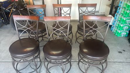 Six designer metal/wooden chairs with leather seats