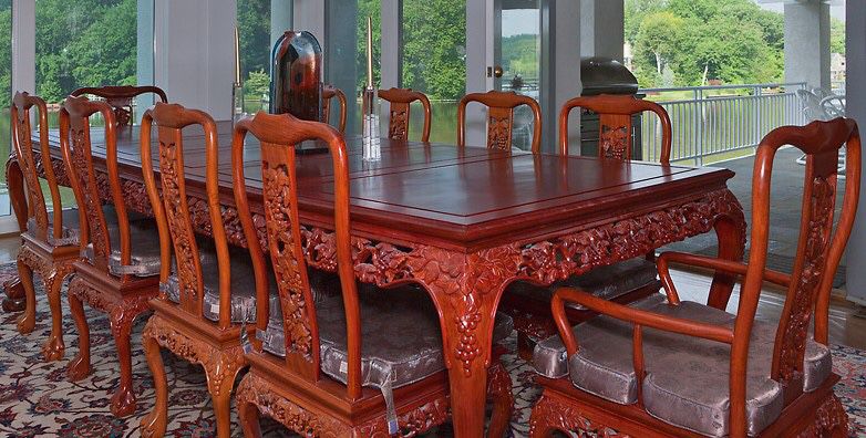 Price reduction - Hand carved Asian rosewood dining room set 114 inches long with 10 chairs, cushions and custom made protective top