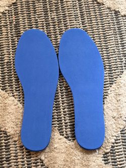 A PAIR OF UNISEX ORTHOTIC INSERTS OR INSOLES IN A SIZE 9-10