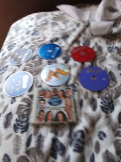 6 dvds movies and 1 music cd for sale