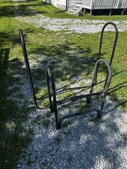 Two Metal Firewood Racks.
