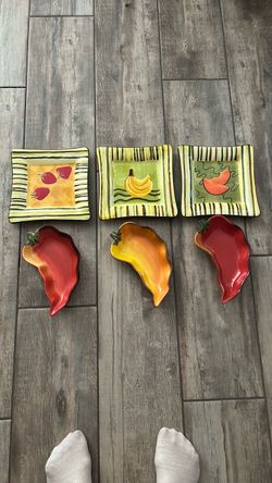 3 plates and 3 chilli serving dishes