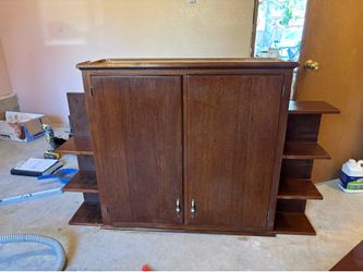 Free hand made cabinets and a shelf