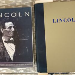 A set of two Lincoln books, one an illustrated biography and the other a picture story of his life.  