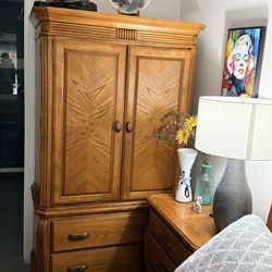 Queen sized bedroom set with adjustable sleigh bed , nightstand & chest.