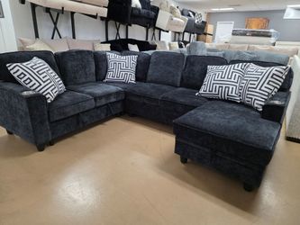 Black Sleeper sectional with lots of storage !!!!