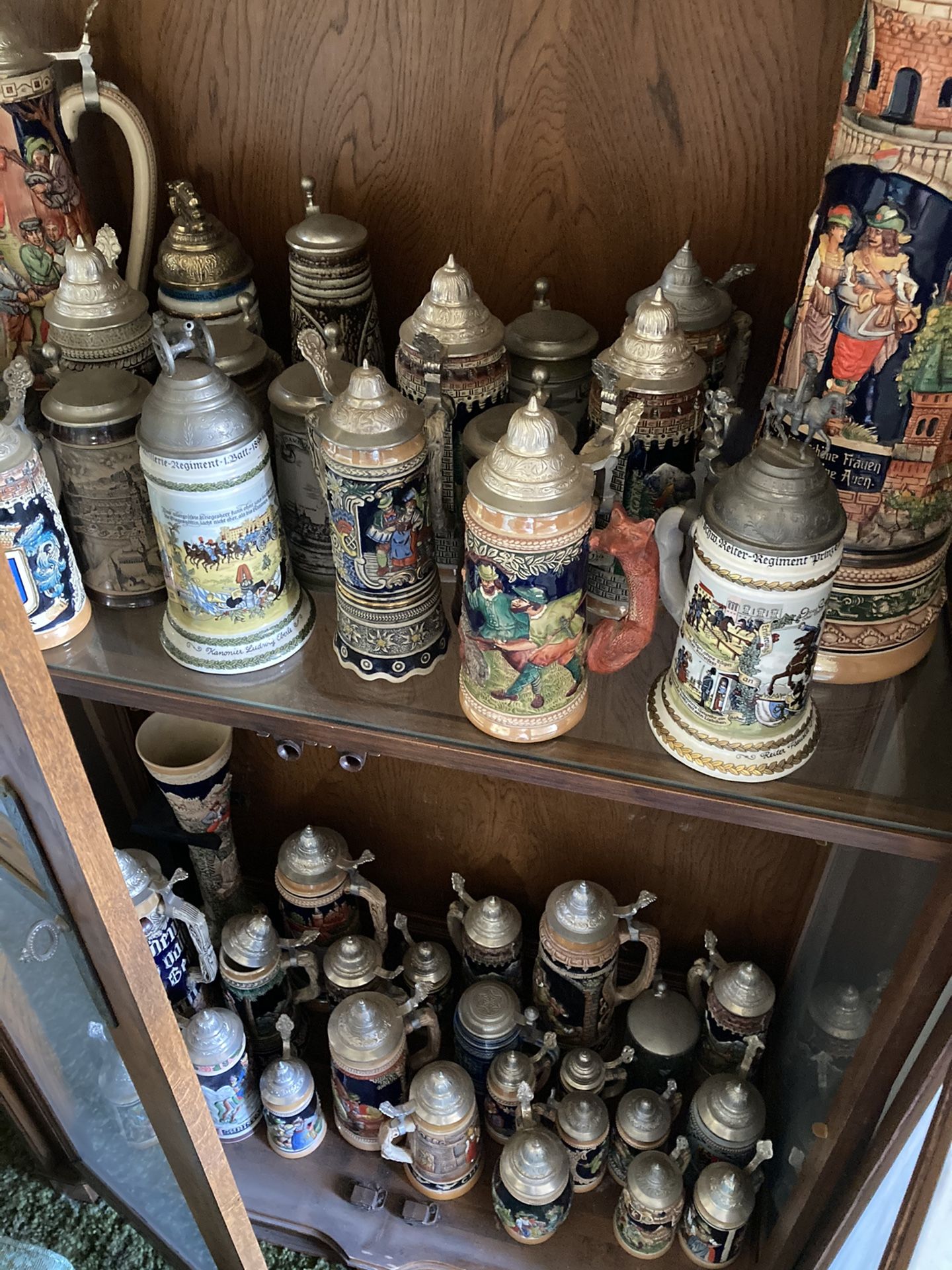 German beer stein collection and cabinet