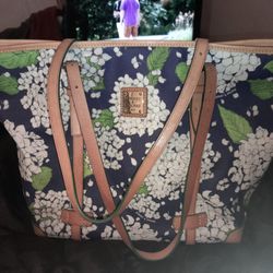 Like New, Used Only A Couple Of Times. Beautiful,  Fun, Dooney& Bourke Tote Purse. Smoke Free, VERY Clean.. Navy With White Flowers. Excellent Condit