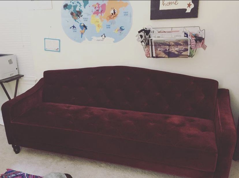 Dark red velvet futon couch