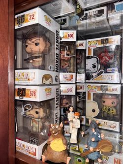 24 Signed Walking Dead Funko Pop Figures and 1 Freddy Funko as Daryl Dixon