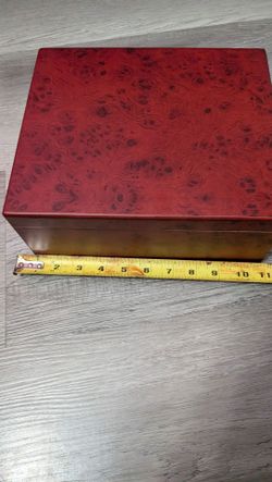 desktop cigar humidor. The high-gloss wood finish is classic for them. Or box