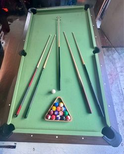 Pool Table with Cues and Ball Set