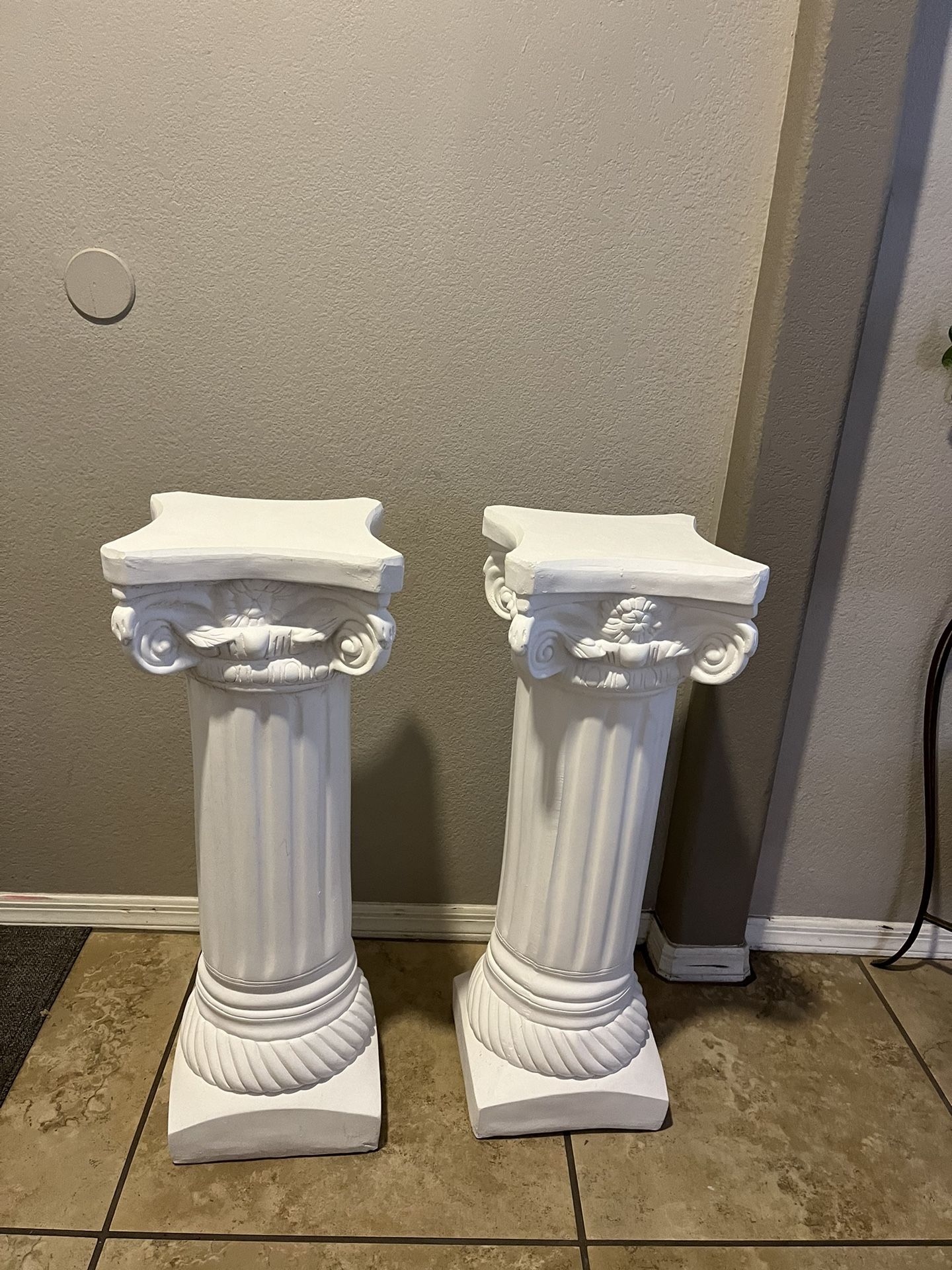 2- 28” tall Pedestal Stand Figurine Sculpture, for Wedding Home Garden Indoor Outdoor Decoration(White). The dimensions are 8.5”Dx8.5”Wx28”H It’s av