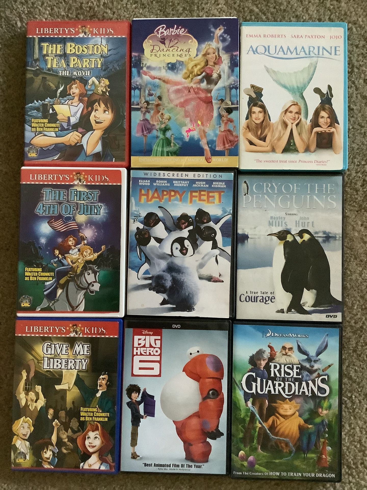 9 DVDs  Set - $1 for the whole set - Barbie, Happy Feet and more