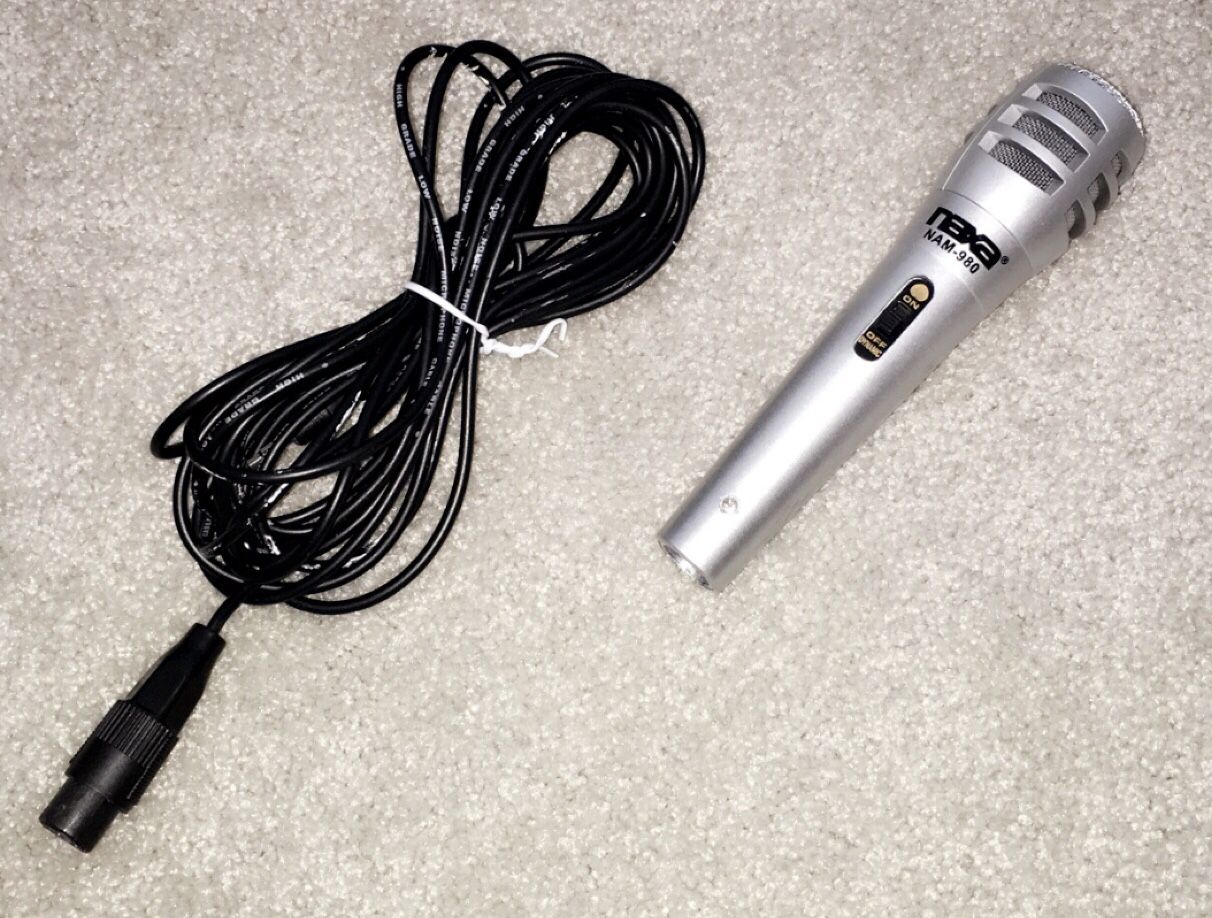 Silver professional microphone with the cord