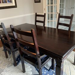 Dining Table Includes 4 Chairs$ 2000