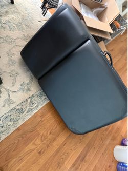 Black massage table