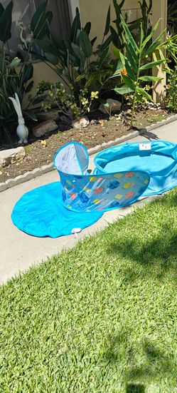 40" portable pool appears to be a foldable "pop-up" style designed for infants, toddlers, or pets with Sun Shade