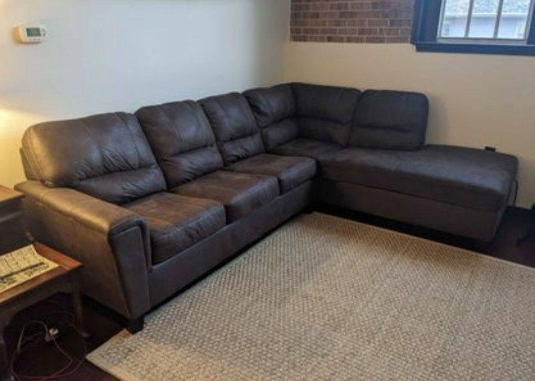 Ashley Navi Sectional Queen Sleeper With Chaise And Warranty