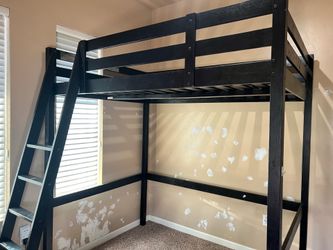 Bunk bed with mattress.