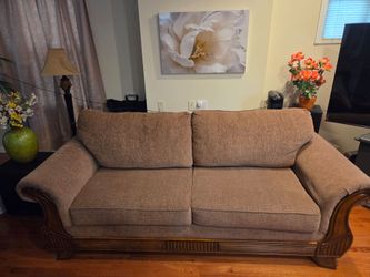 Three piece sofa, loveseat and center table.