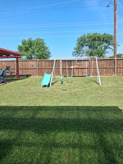 Kids swing set. Great condition. Need it gone grand baby out grew it.