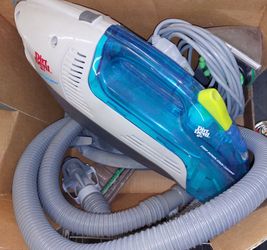Dirt Devil Spot Scrubber,
handheld carpet and upholstery
cleaner