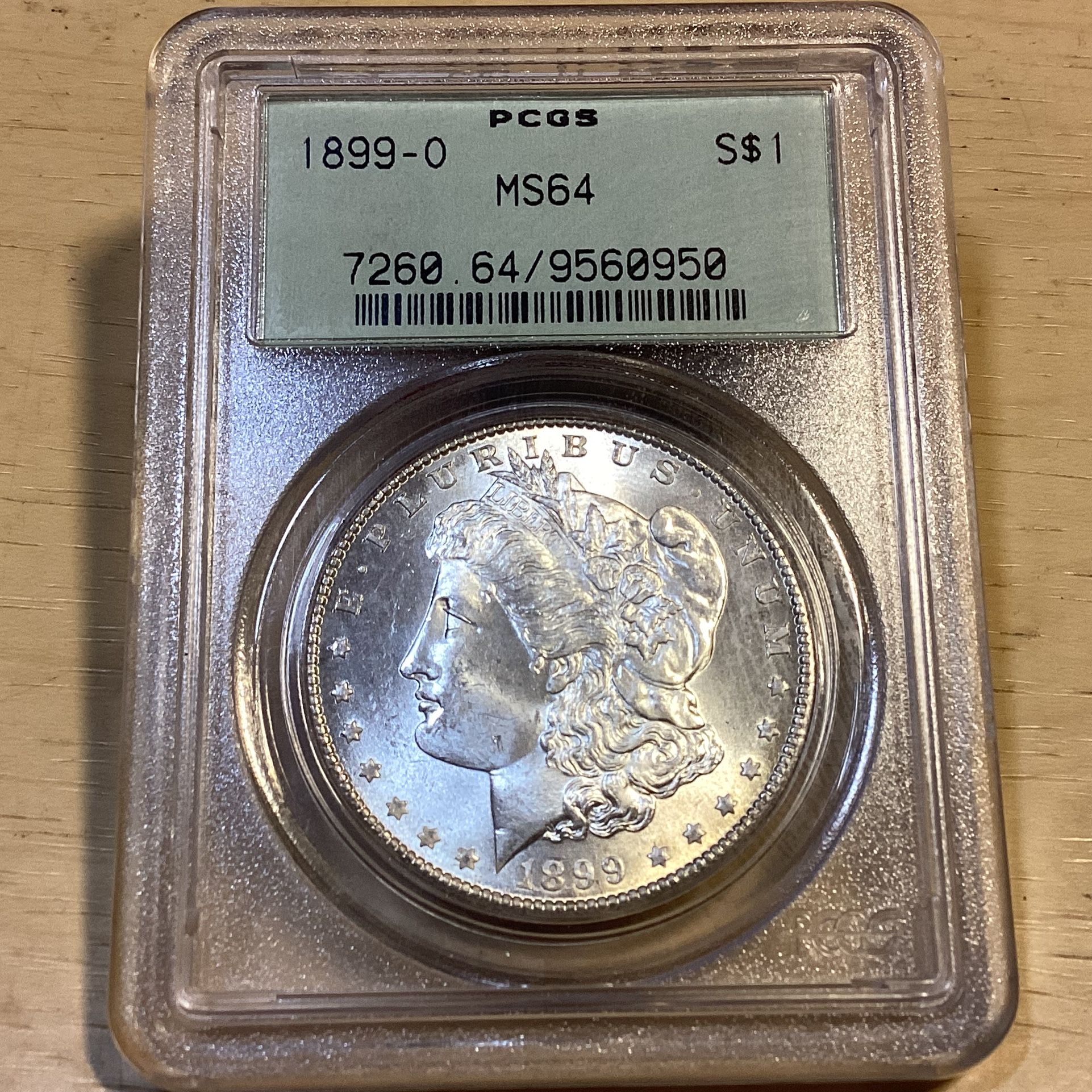 Graded 1899 O Morgan Silver Dollar