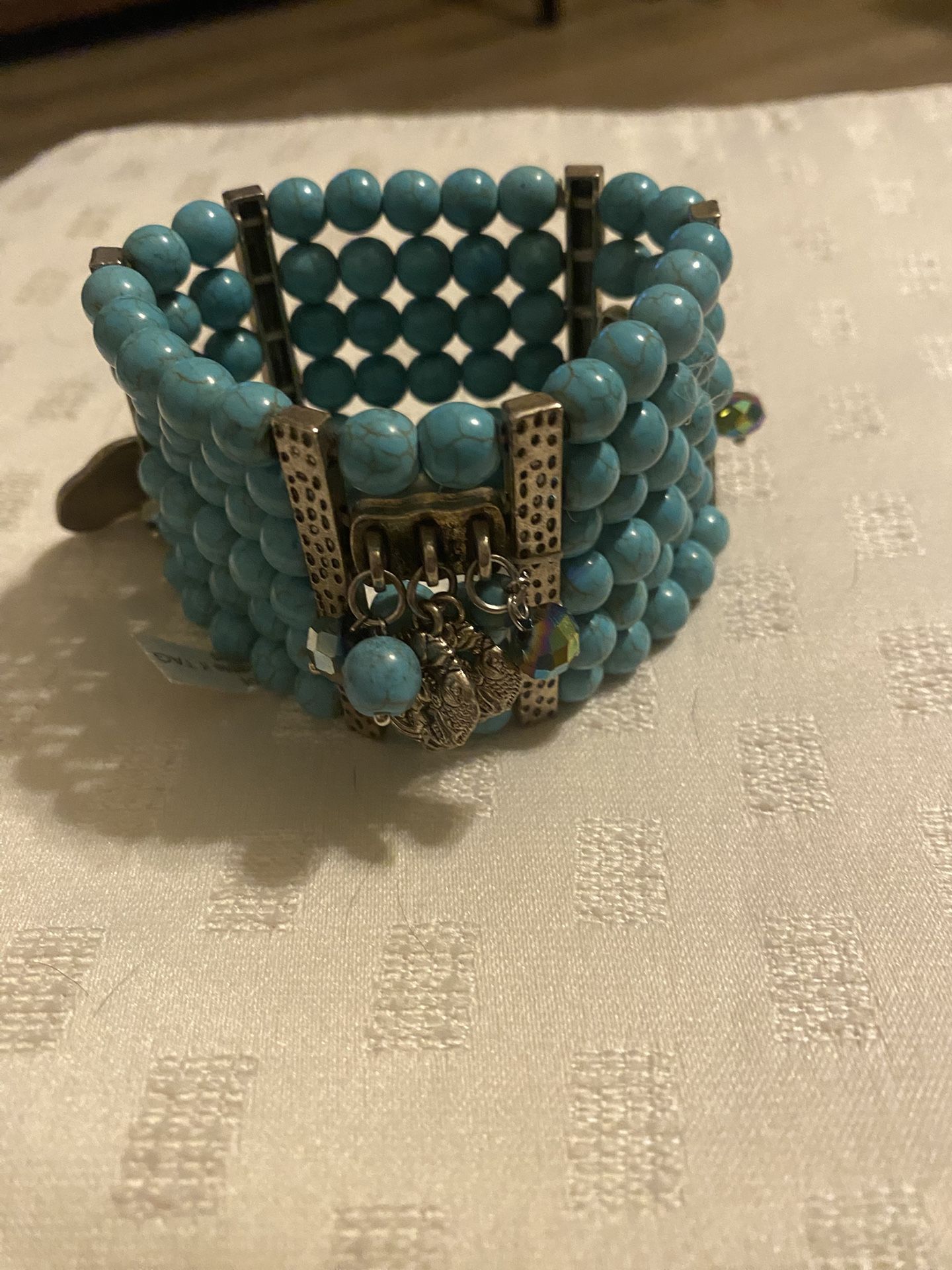 Six Strand Turquoise Colored Beaded Bracelet 