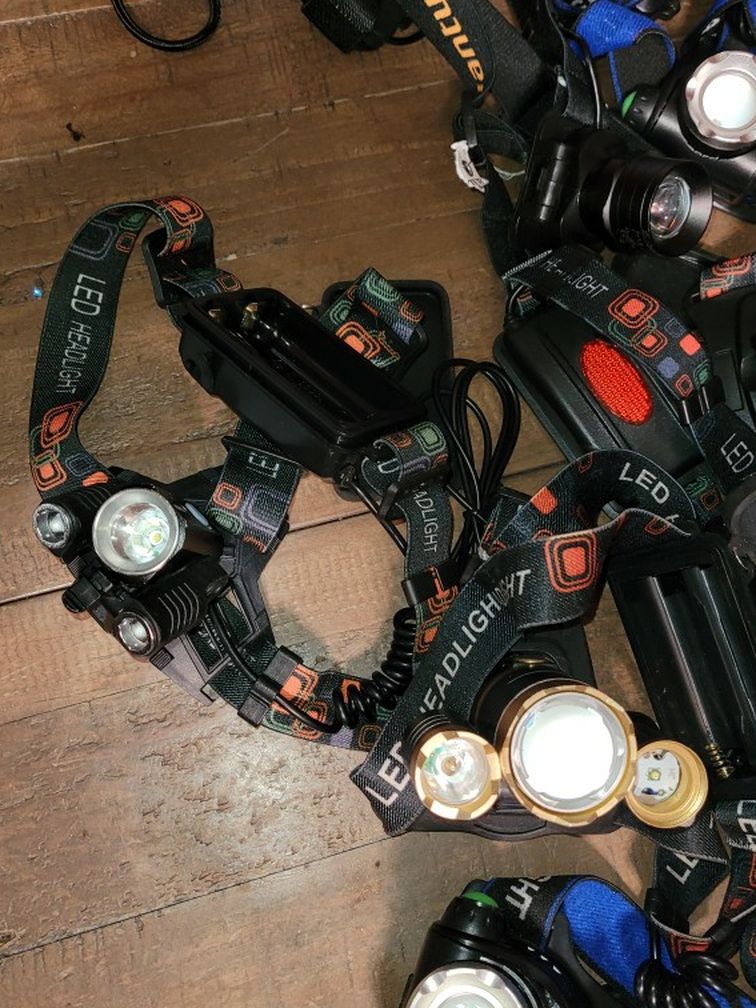 Lot Of Headlights Only. Needs Batteries And Chargers