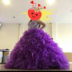 Size 14 Quinceanera or Prom Dresss Adjustable size up or down back is a tie