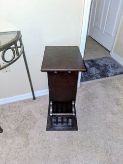 Sofa table  . Goes under weather sofa or could be a sidd