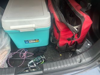 Husky wheel tool bag and cooler bag has tools wire cutter staple gun hammer screw drivers crow bars 50$ for everything