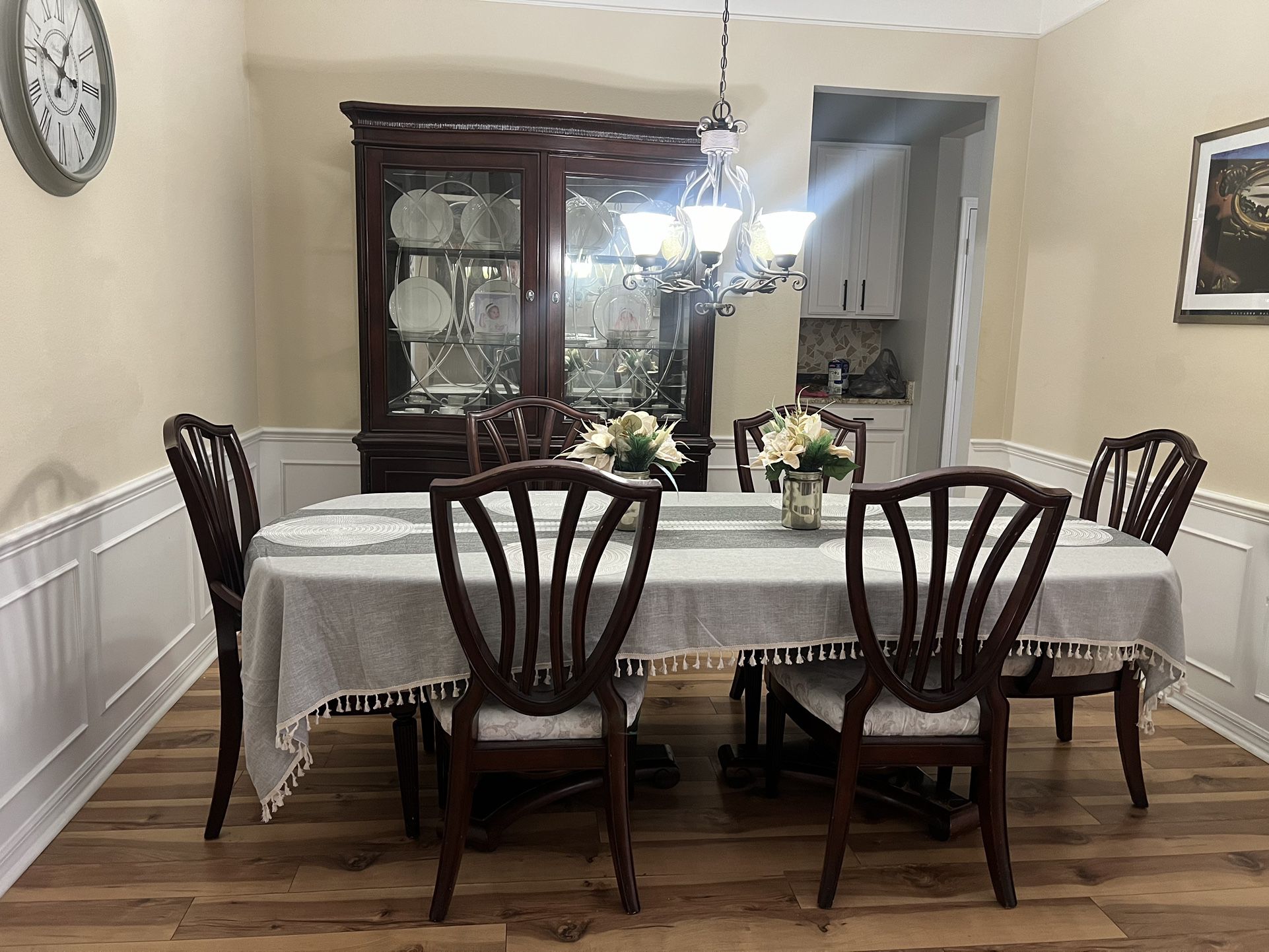 Brown china cabinet And Eating Table 6 Chairs