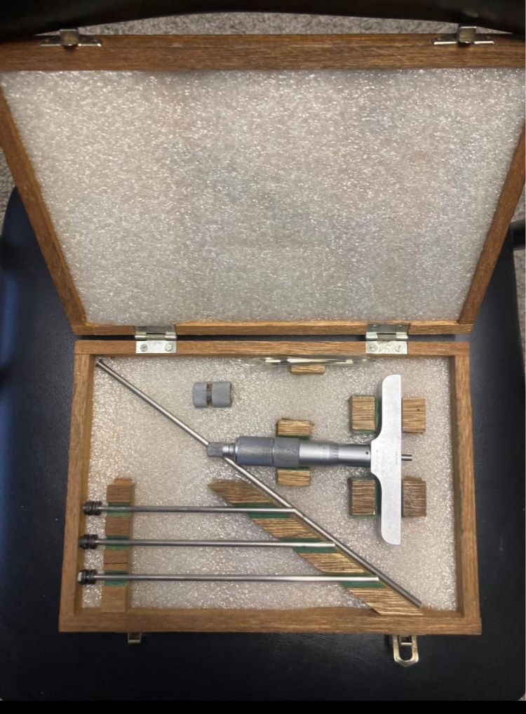 Mitutoyo Depth Micrometer with Groove adapter.