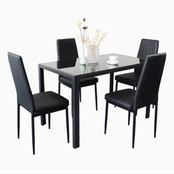 Black Glass Table With 4 Brand New Chairs
