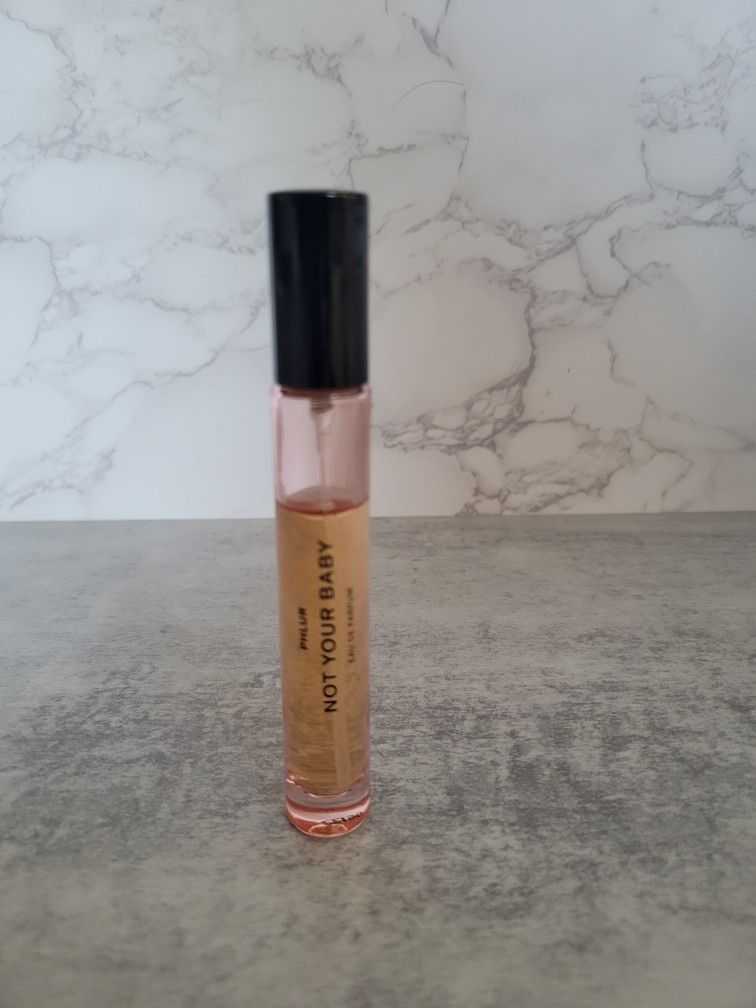Phlur Not Your Baby Travel perfume spray, used
