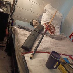 Que Stick