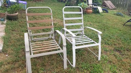 two aluminum chairs